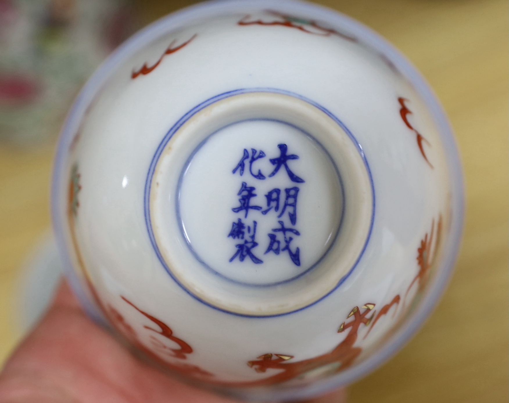 An early 20th century Chinese blue and white vase, a famille rose tea pot, etc. (5)